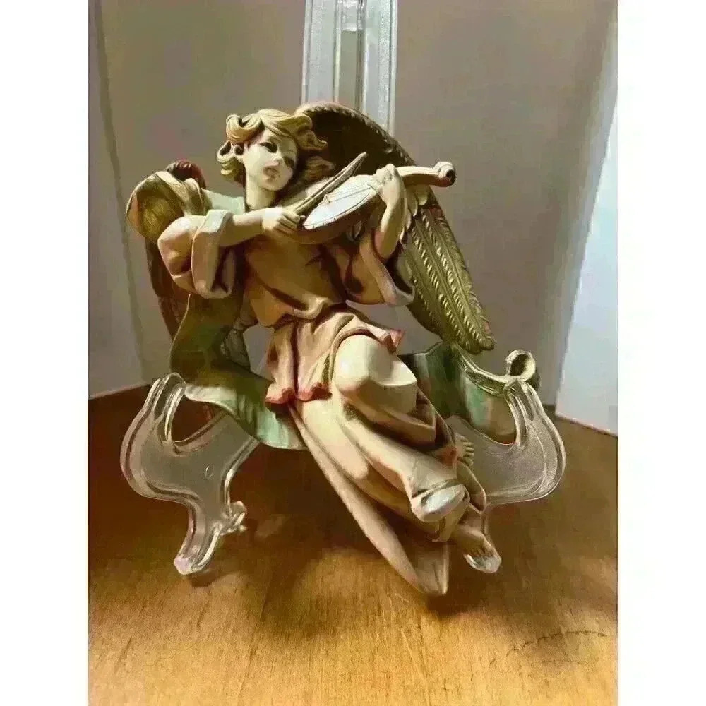 Simonetti AngelCherub‎  playing violin